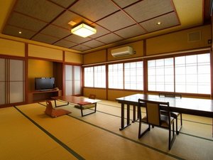 源泉かけ流し半露天風呂付客室「つむぎの間」