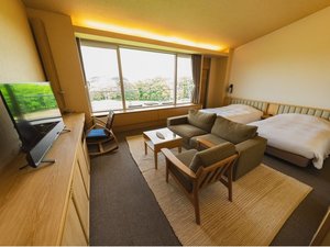 約40平米のツインベッドルームに、ゆったりとくつろげる和室10帖