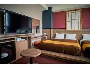 最上階のデラックスツインルーム。陽当たりが良く、ご家族の方にリラックスしてご利用いただけます。