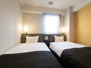 ツインルーム 全客室に大型テレビ、Wi-Fi、エアコン完備。