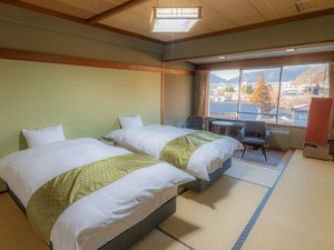 【ツインベッド】和室10畳ゆったりとしたシモンズ製セミダブルベッドを配した客室です。