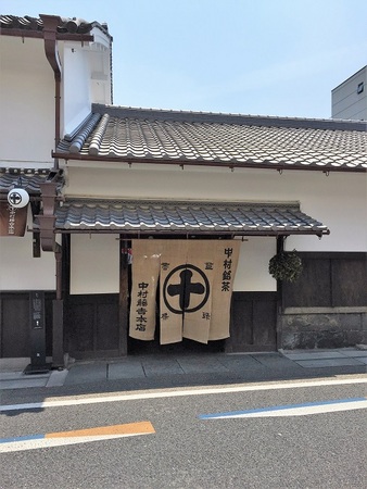 �������g�{�X