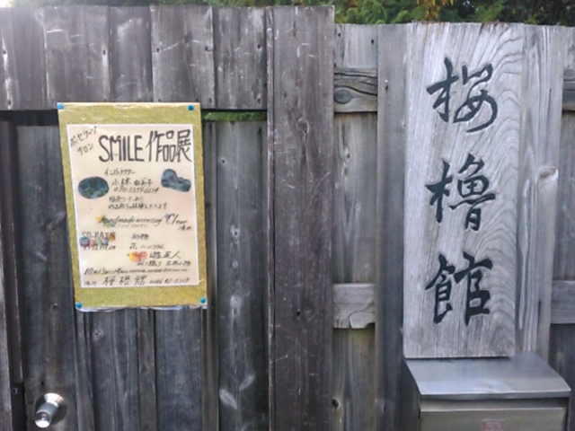��@_���E��