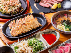 餃子家まるに 春日 東口別館の写真1