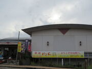 L̂Ђ܂艷@EE̓eʐ^1