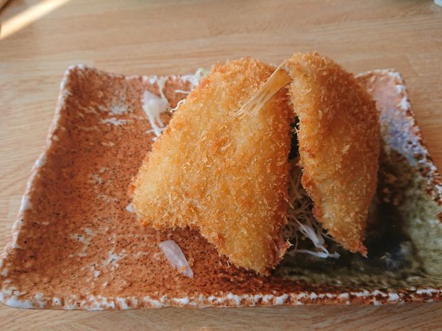 E102̊@܂͐H 񂭂X̓eʐ^1